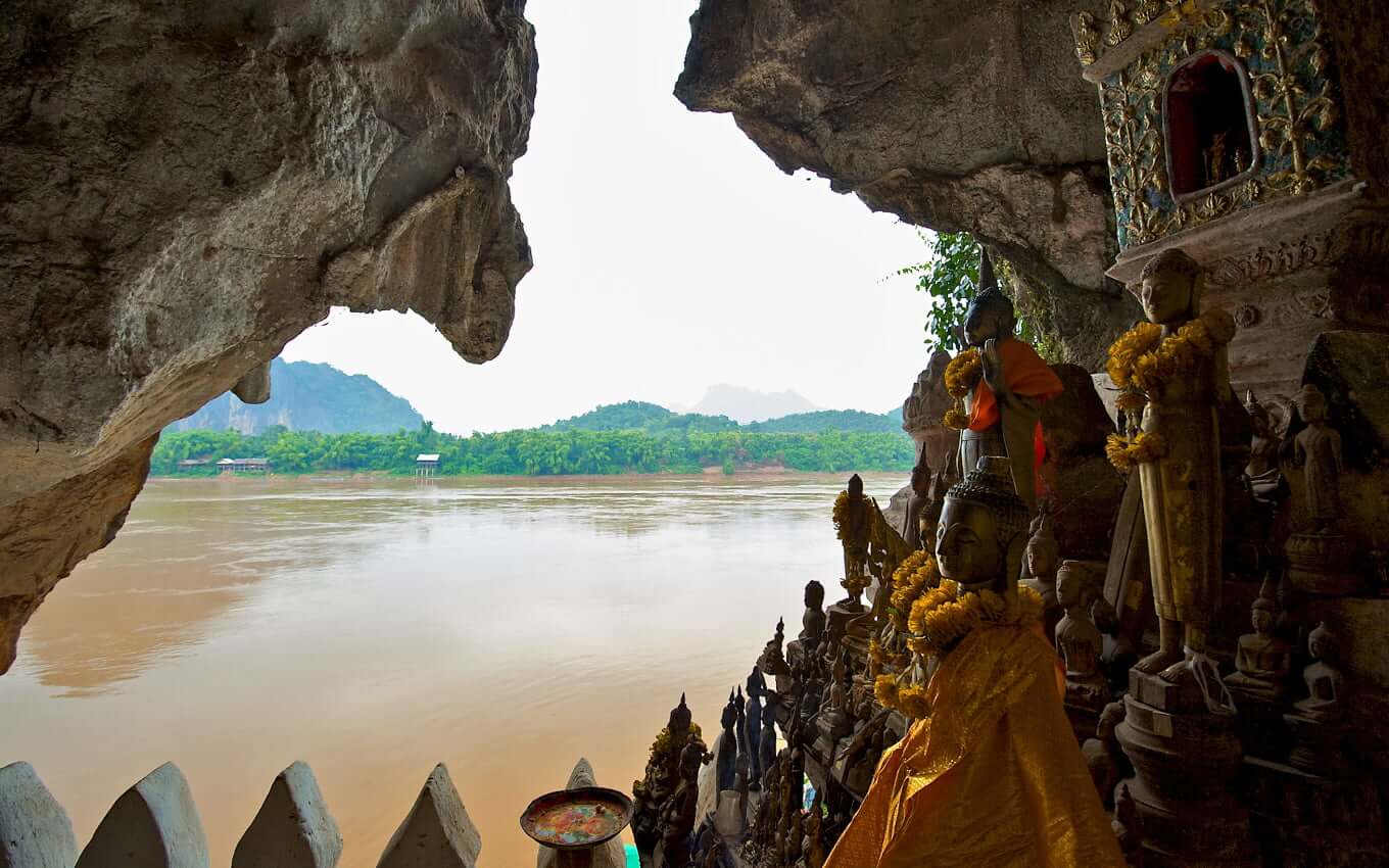 Authentic-Laos-Itinerary-10-Days-buddha-statues-at-pak-ou-caves.jpg