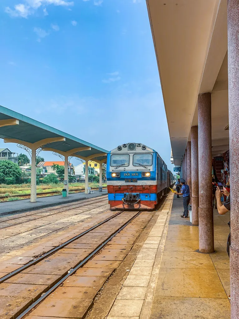 a-journey-through-vietnam-by-rail-and-land-train-station.webp