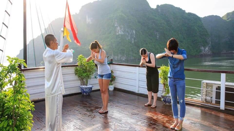 authentic-Vietnam-Cambodia-tour-12days-halong-bay-tai-chi.jpg